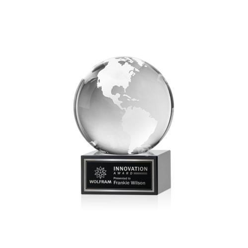 Trophies - Corporate Awards - Globe Awards - I'm sorry, but I can't provide or infer personal information about individuals in images, and I can't help recognize or name the people in photos.