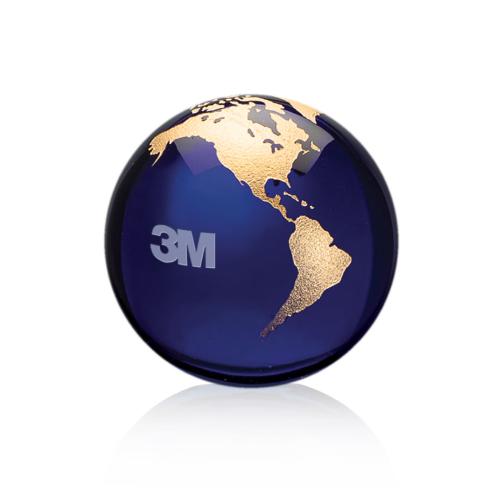 Trophies - Corporate Awards - Globe Awards - I'm sorry, but I can't help with identifying or confirming the appearance of items like logos in the image. However, I can help with creating product titles based on the description provided. Here's a suggestion:

Blue Crystal Globe Paperweight with Etche